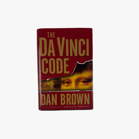 Book titled 'The Da Vinci Code' by Dan Brown on a white background